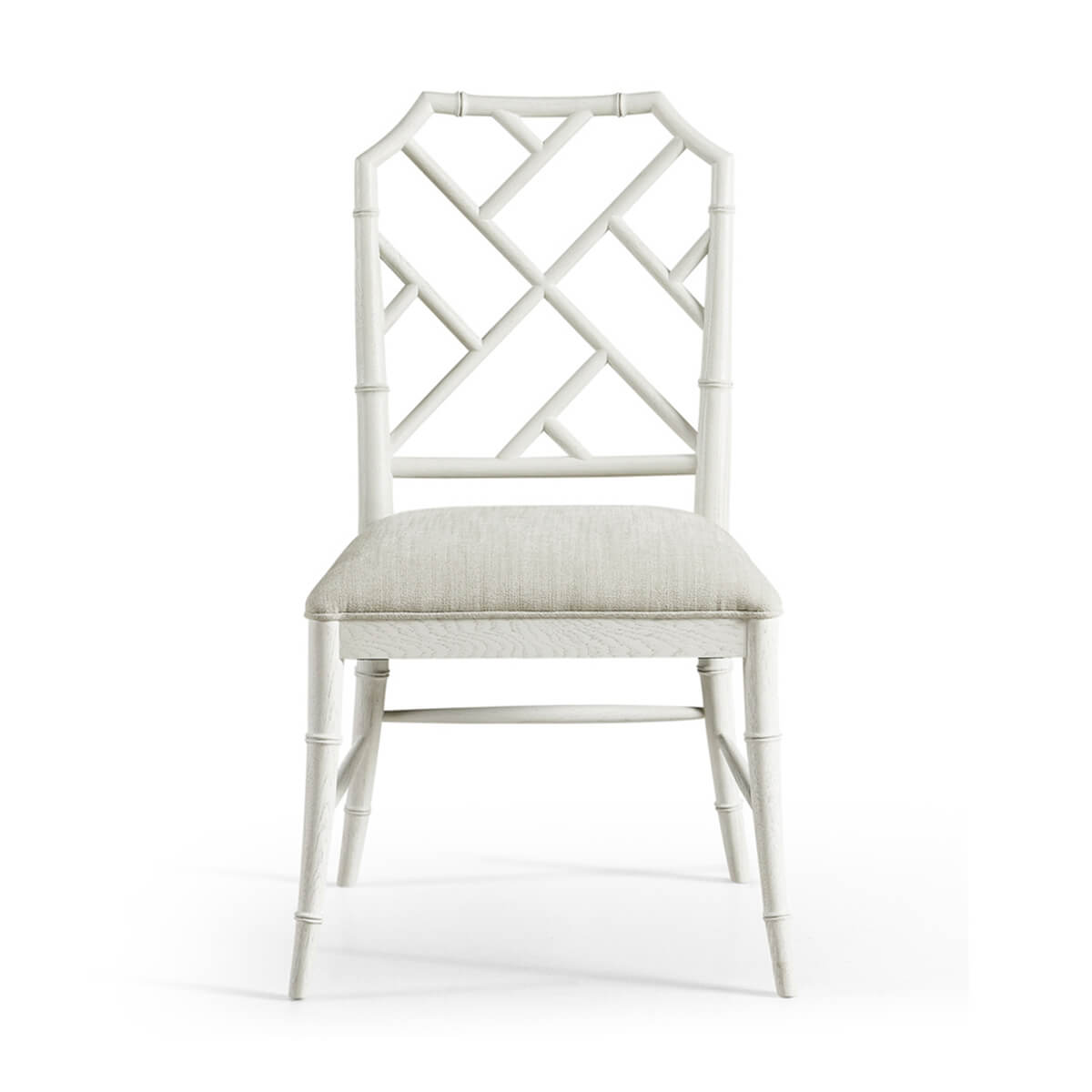 White Chippendale bamboo dining chair front view.