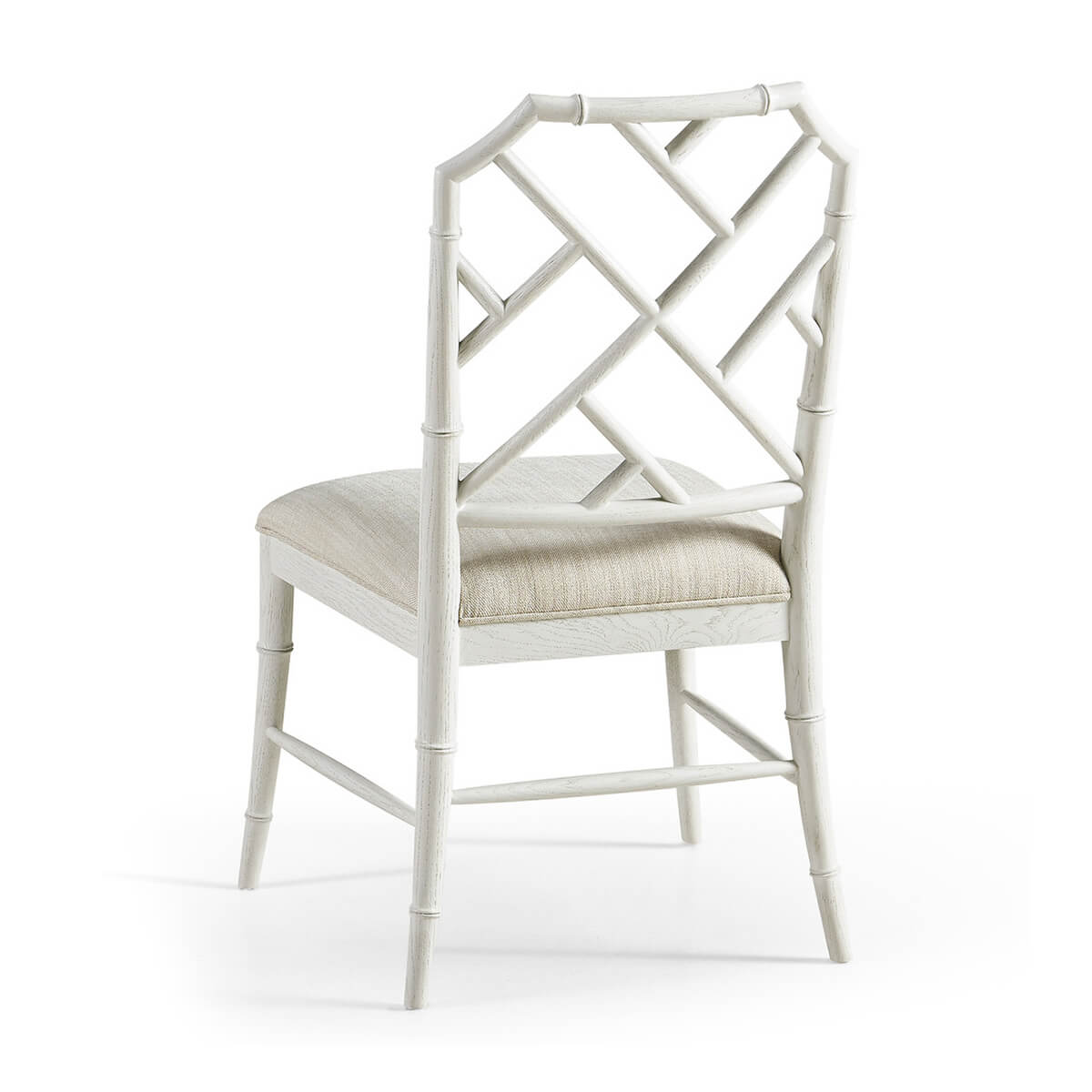 White Chippendale bamboo dining chair back angled view.