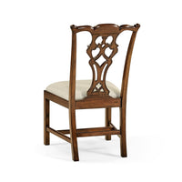 Back view of Chippendale dining chair, ornate design.