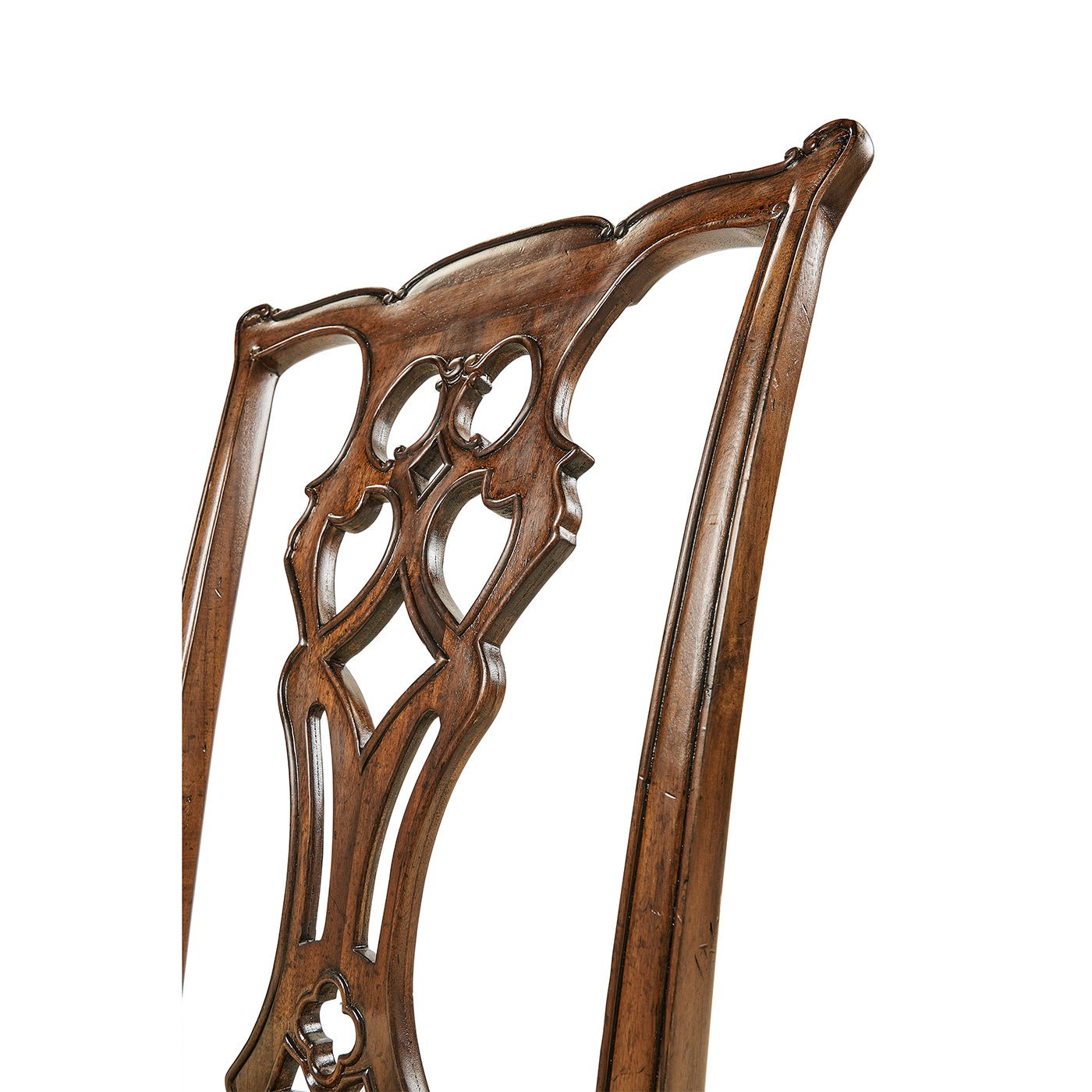 Detailed view of Chippendale chair, intricate carving.