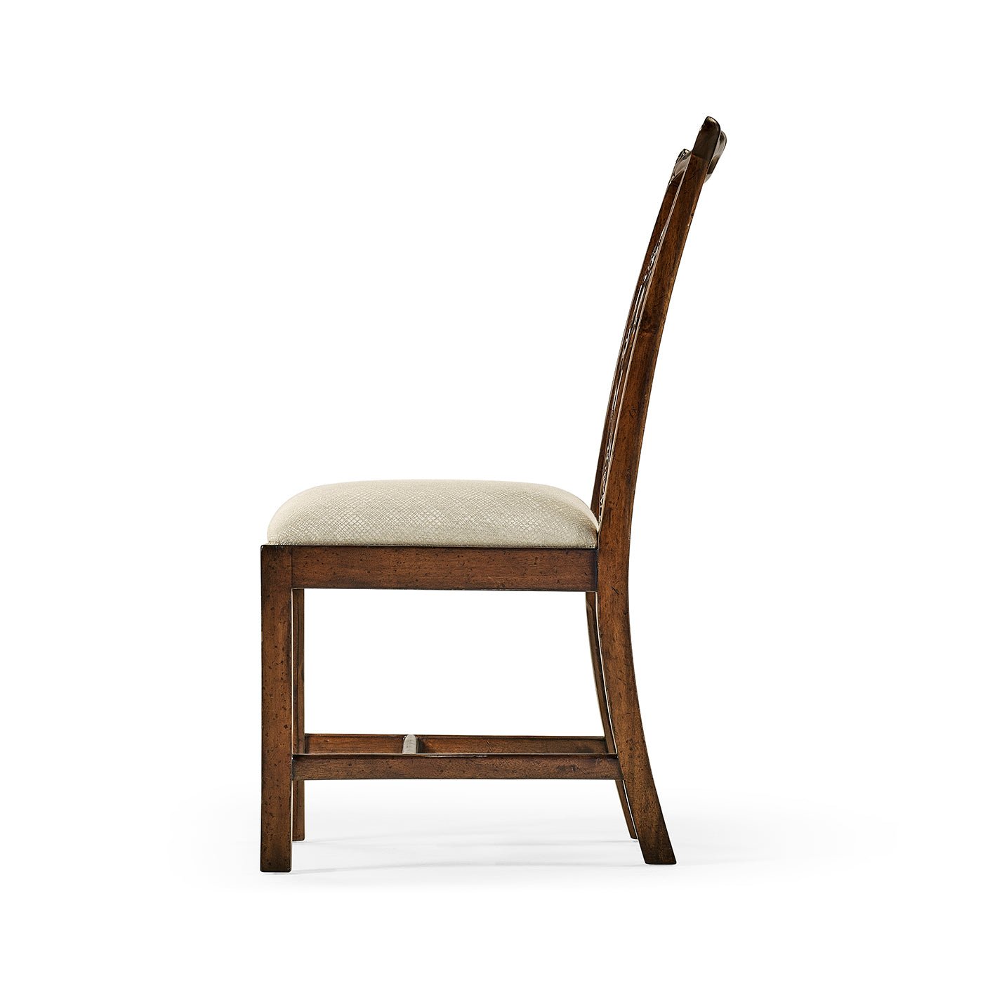 Side profile of Chippendale dining chair, classic mahogany.