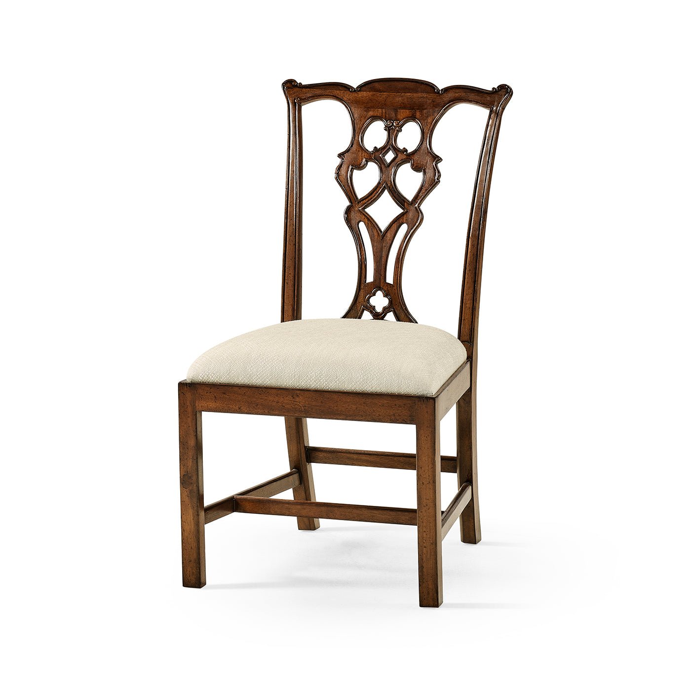 Chippendale dining chair, angled view, carved mahogany design.