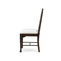 Side profile of Chippendale faux bamboo dining chair.