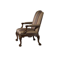Side view Chippendale Gainsborough armchair, ornate legs, striped upholstery.