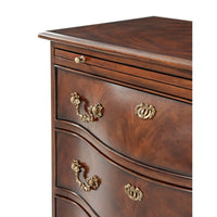 Close-up of nightstand drawer handles and top edge.