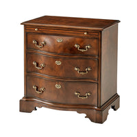 Chippendale mahogany bedside chest, angled view.