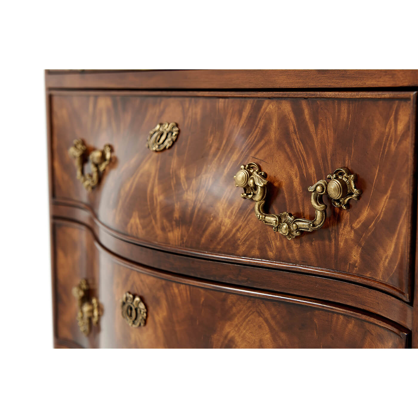 Close-up of nightstand's decorative drawer handles.