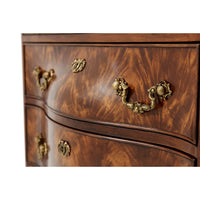 Close-up of nightstand's decorative drawer handles.
