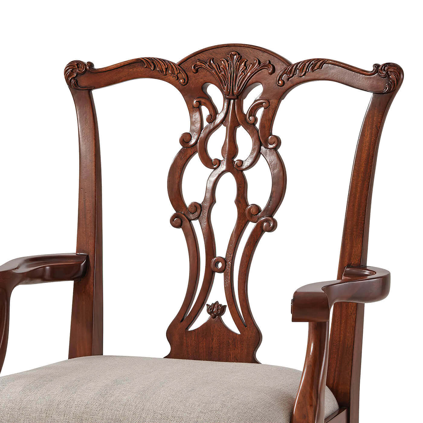 Close-up of backrest design on mahogany dining armchair.
