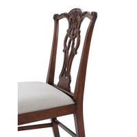 Close-up of Chippendale dining chair backrest design.