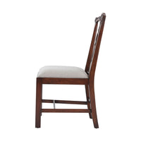 Side profile of Chippendale mahogany dining chair.