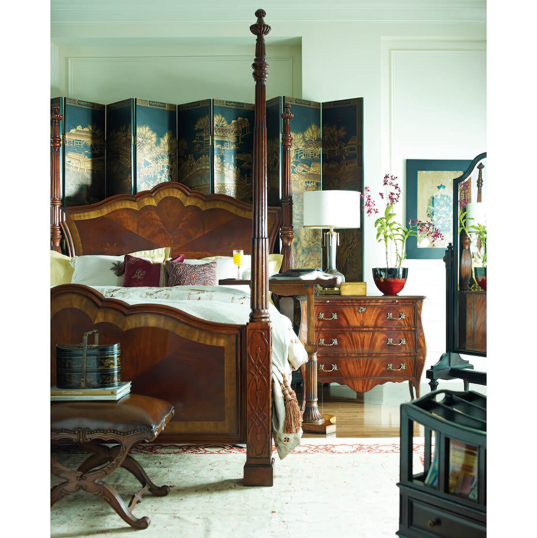 Luxurious bedroom featuring mahogany four post bed.