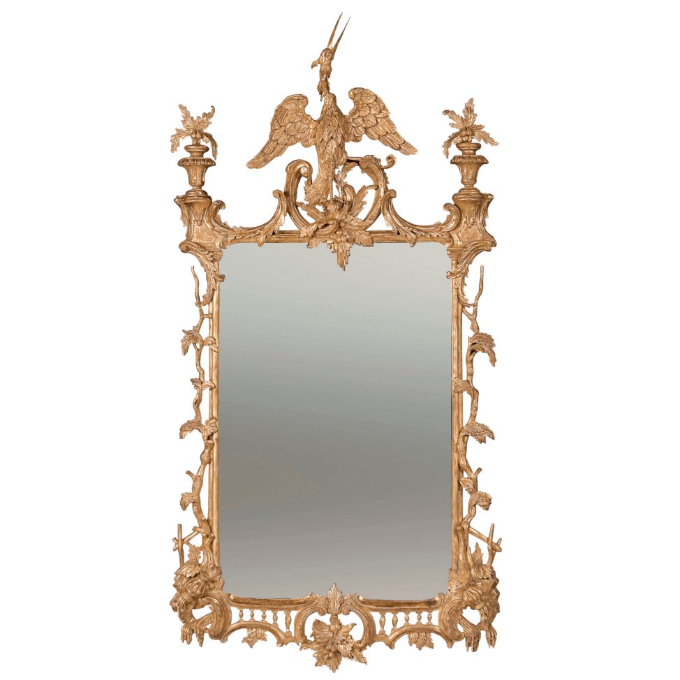 Ornate Chippendale mirror with Ho Ho bird on top.