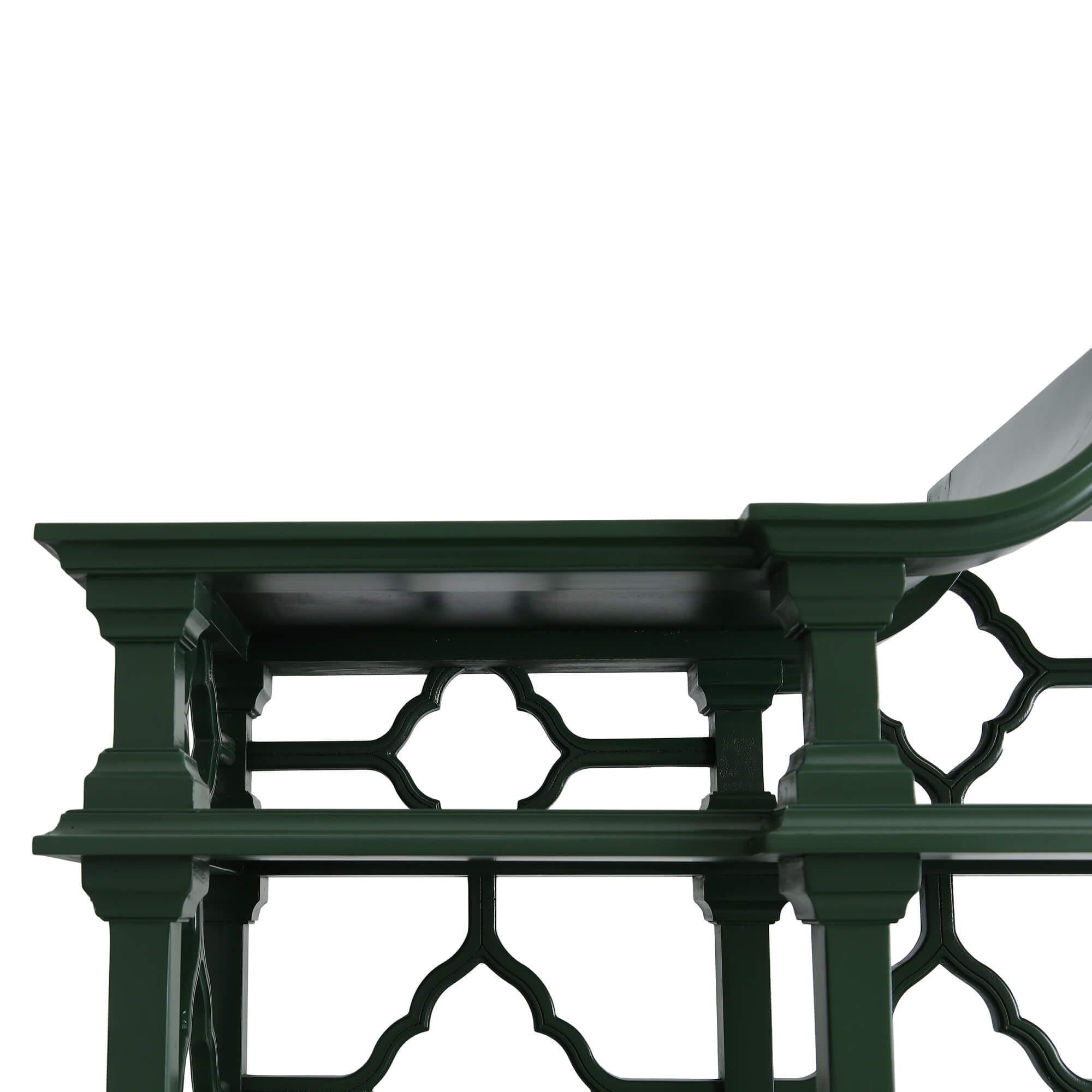 Close-up of top corner, Chippendale green bookshelf.