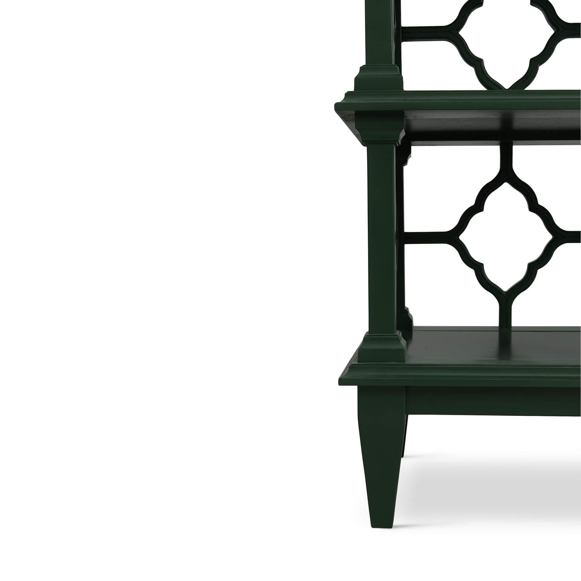 Close-up of bottom corner, Chippendale green bookshelf.