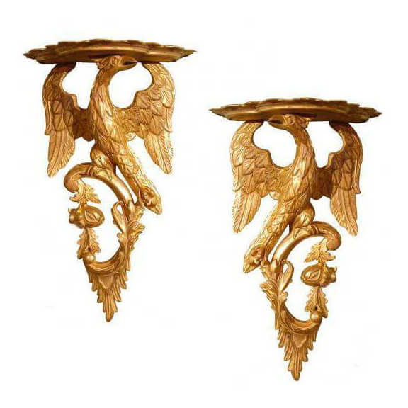Ornate Chippendale wall brackets with eagle design.