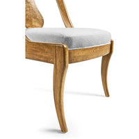 Close-up of classic antique dining chair front leg.