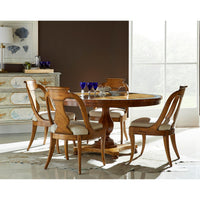 Classic antique dining chairs set around dining table.