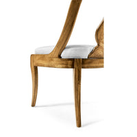 Sideview of classic antique dining chair leg structure.