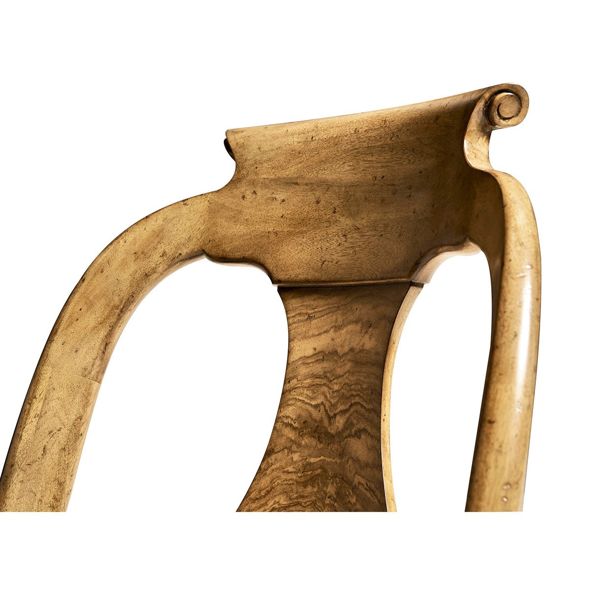 Detailed view of classic antique dining chair top.