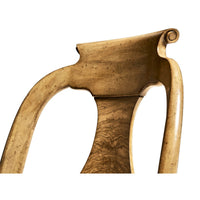 Detailed view of classic antique dining chair top.