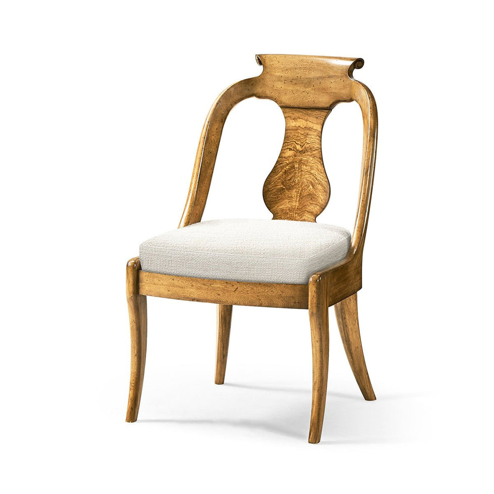 Front angle of classic antique dining chair, wooden frame.