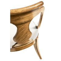Overhead view of classic antique dining chair seat.