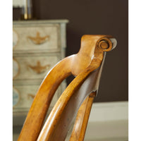 Top detail of classic antique dining chair backrest.