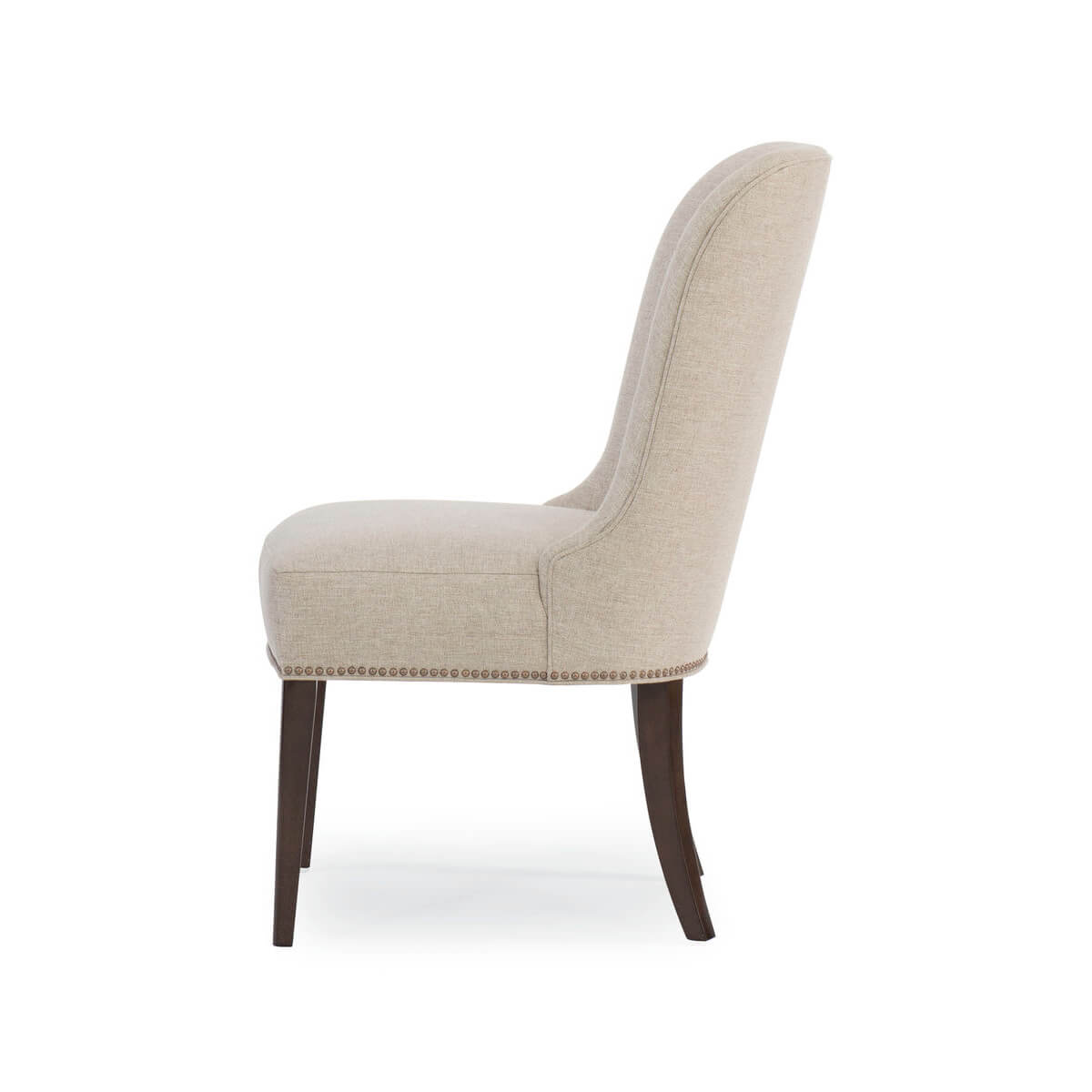 Side profile of beige art deco dining chair, elegant silhouette.