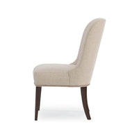 Side profile of beige art deco dining chair, elegant silhouette.