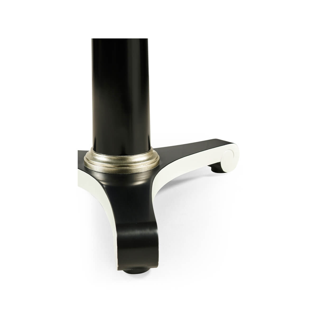 Close-up of pedestal base, classic dining table design.