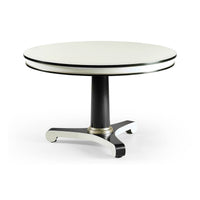 Round black and white dining table with pedestal base.
