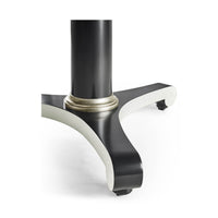 Base detail, round dining table with black and white legs.