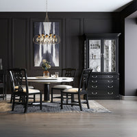 Elegant dining room featuring a black display cabinet.