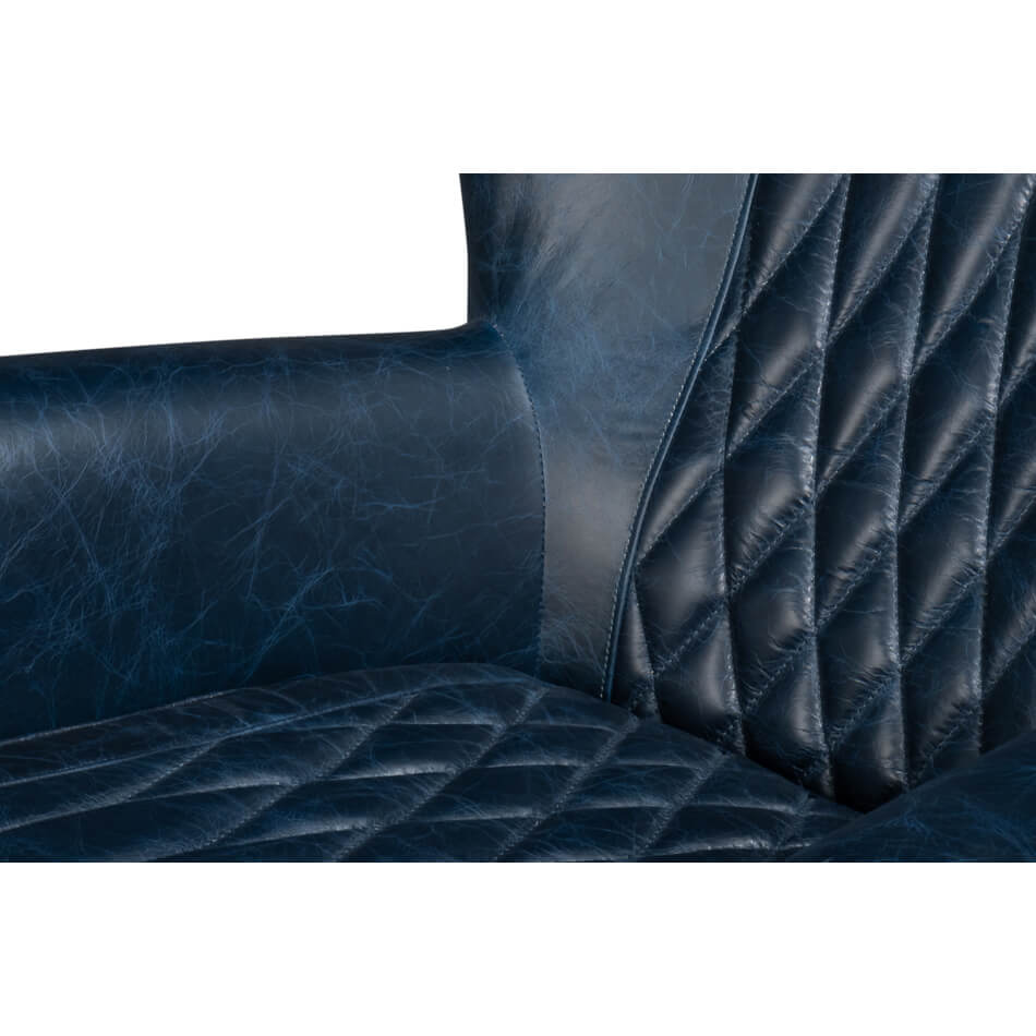 Blue leather swivel chair, close-up, seat and backrest.
