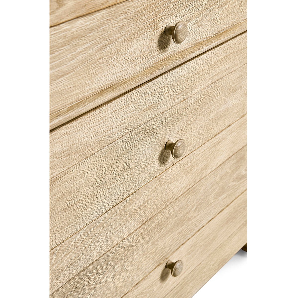 Classic bombe chest, close-up of front drawer knobs.