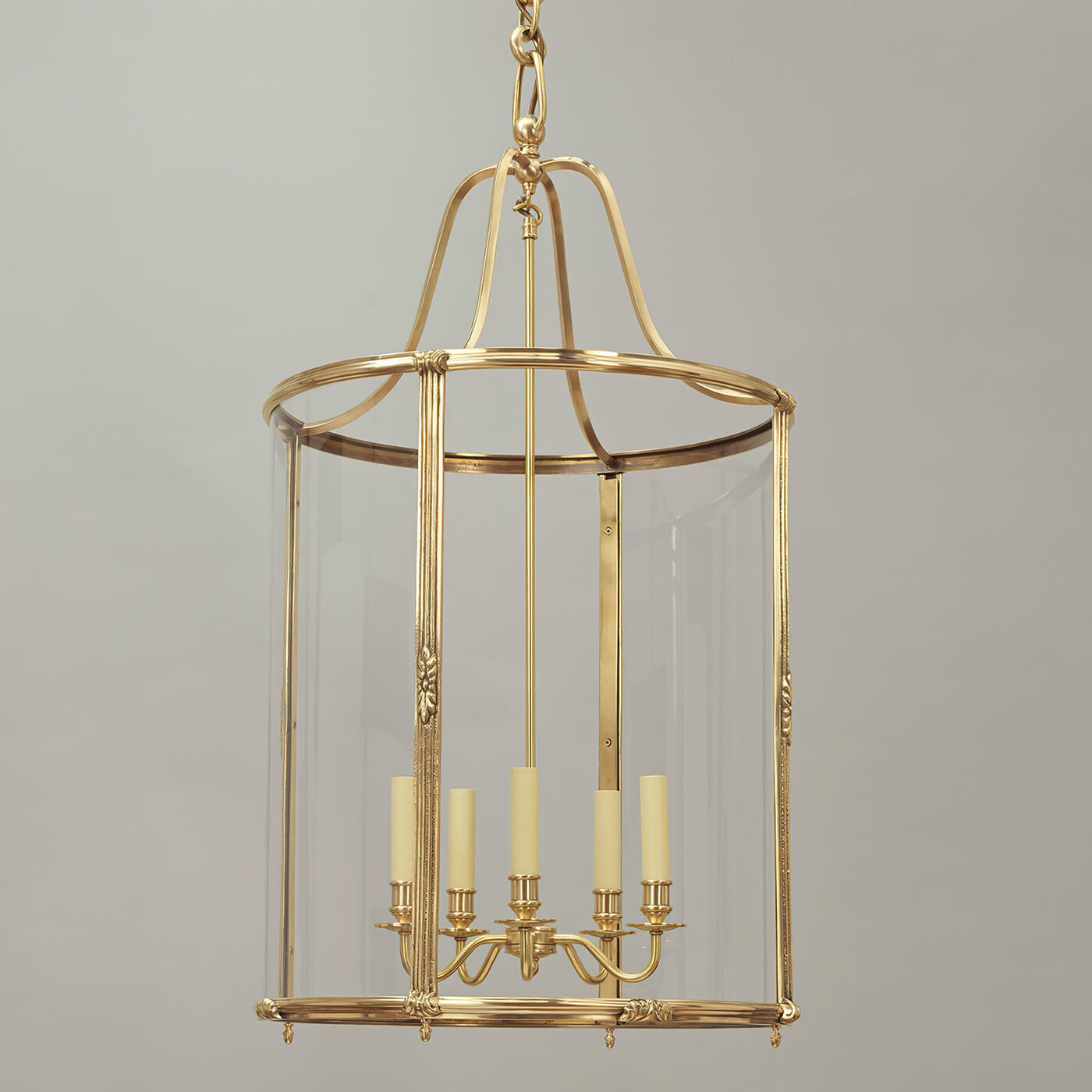 Brass hall lantern close-up with glass panels.