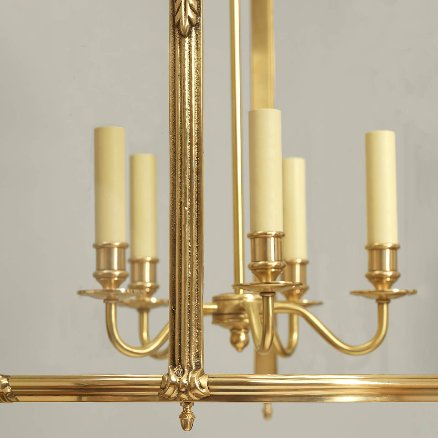 Brass hall lantern candle-style lights close-up.