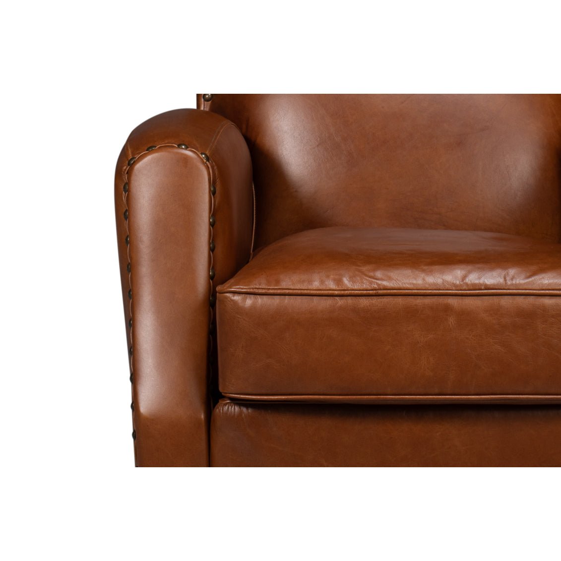 Brown leather swivel armchair armrest close-up.