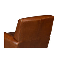 Brown leather swivel armchair backrest close-up.