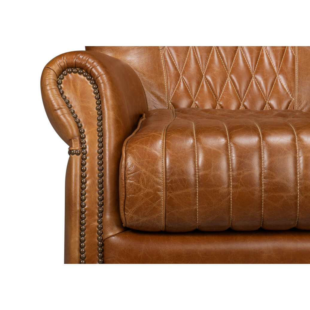 Detailed armrest with nailhead trim on swivel chair