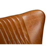 Top corner view of leather swivel chair