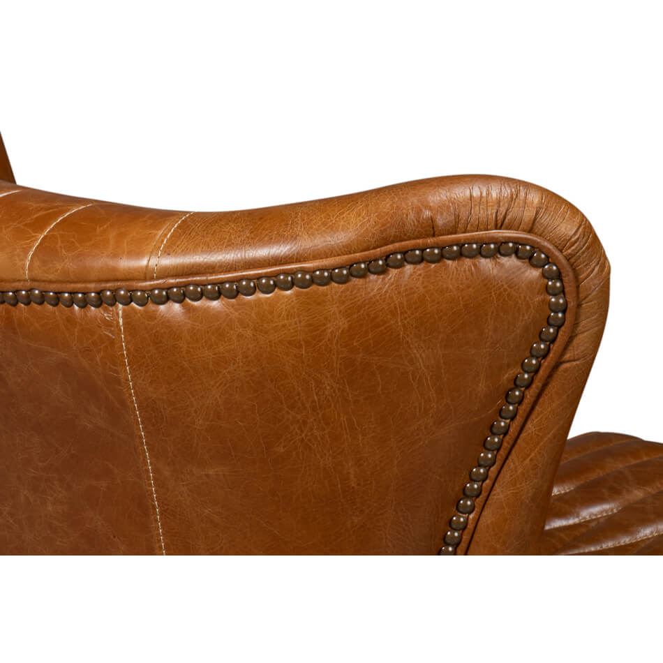 Backrest detail on brown leather swivel chair