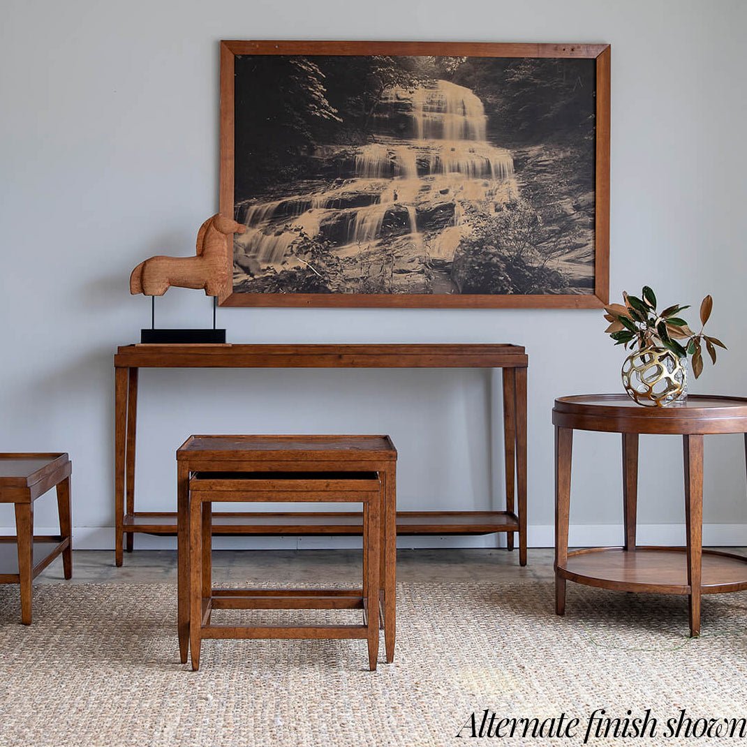 Classic console table styled in room, alternate finish shown.
