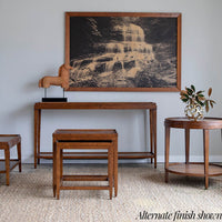 Classic console table styled in room, alternate finish shown.