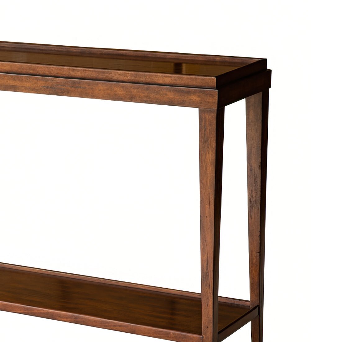 Close-up of console table's corner, country finish detailing.