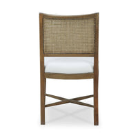 Back view of dining chair showcasing cane detailing.