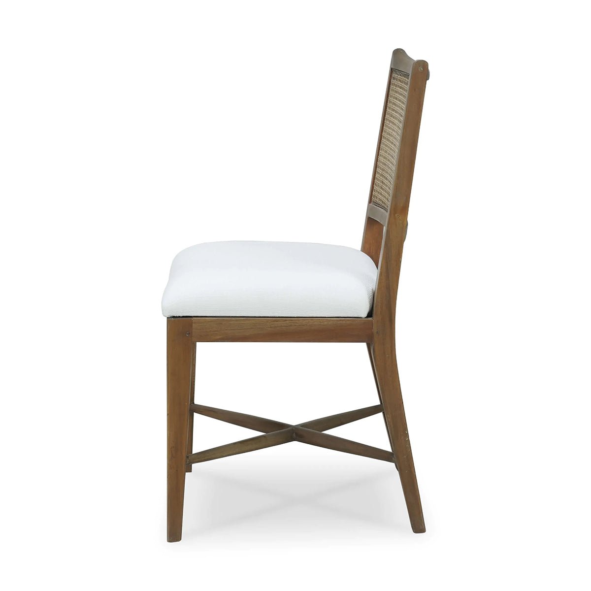 Side view of wooden dining chair with white seat.