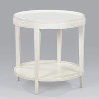 White round end table on gray background, full view.