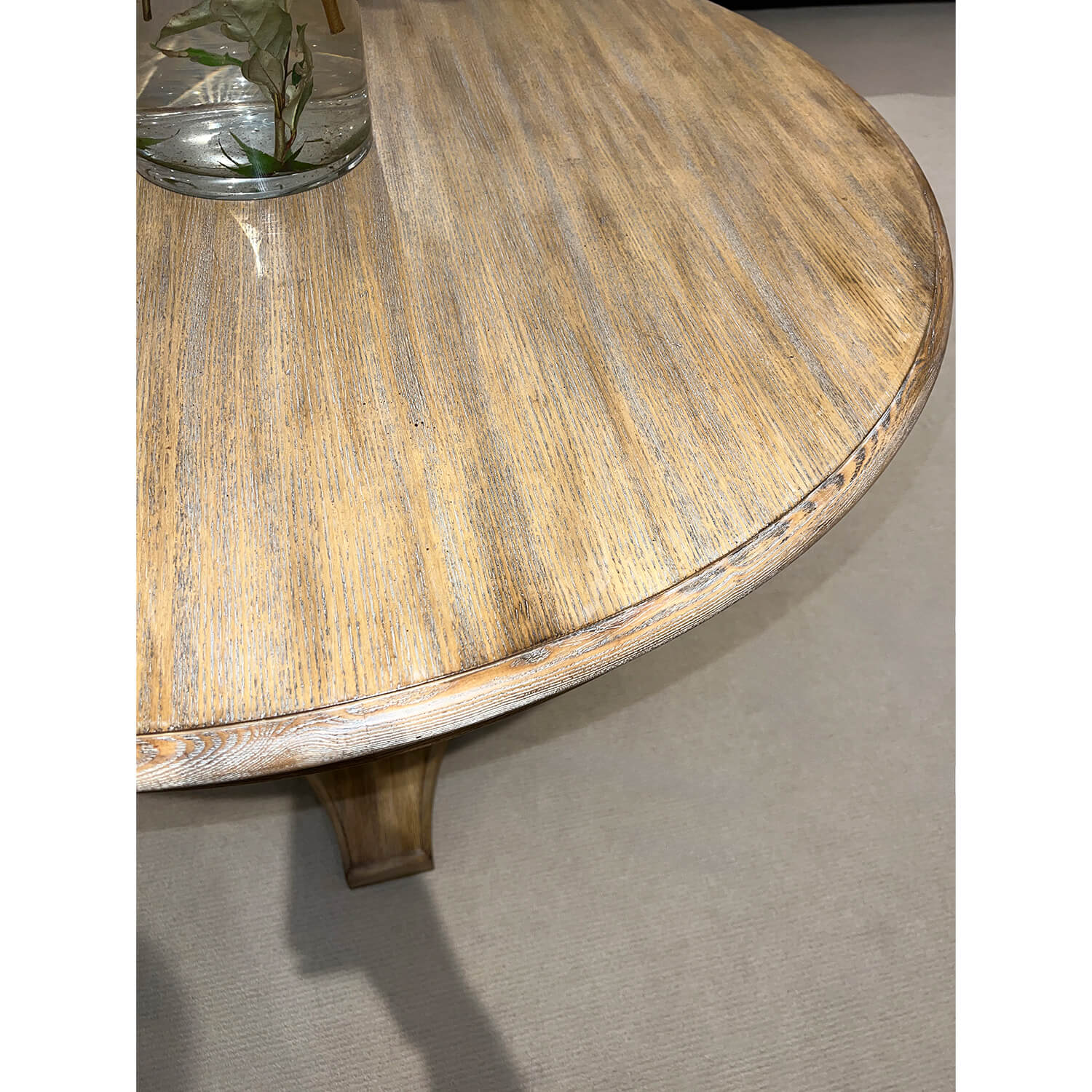 Detailed view of wooden table edge and surface texture.